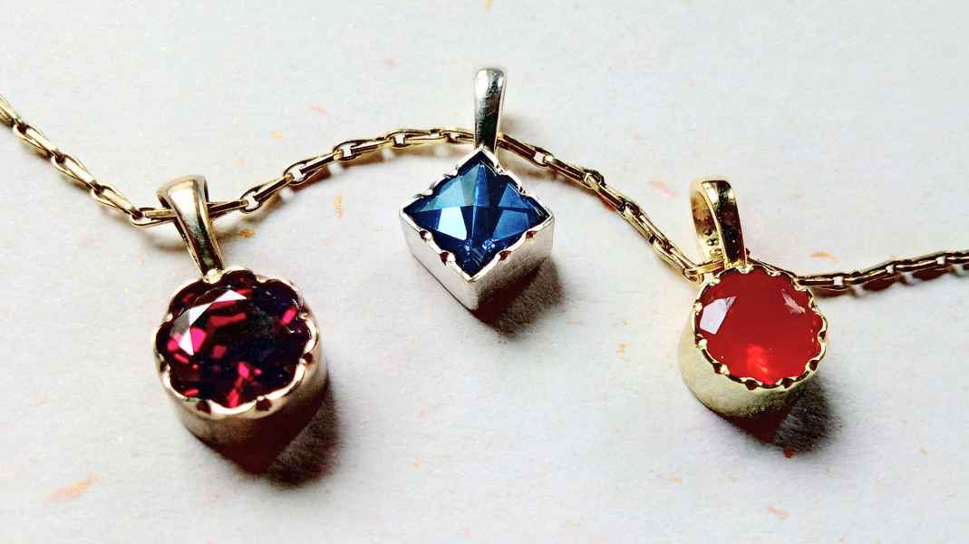 Granat/Spinell/Feueropal in Bogenfassung